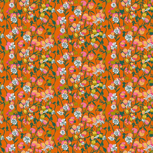 Floral pattern with small flowers on an orange background
